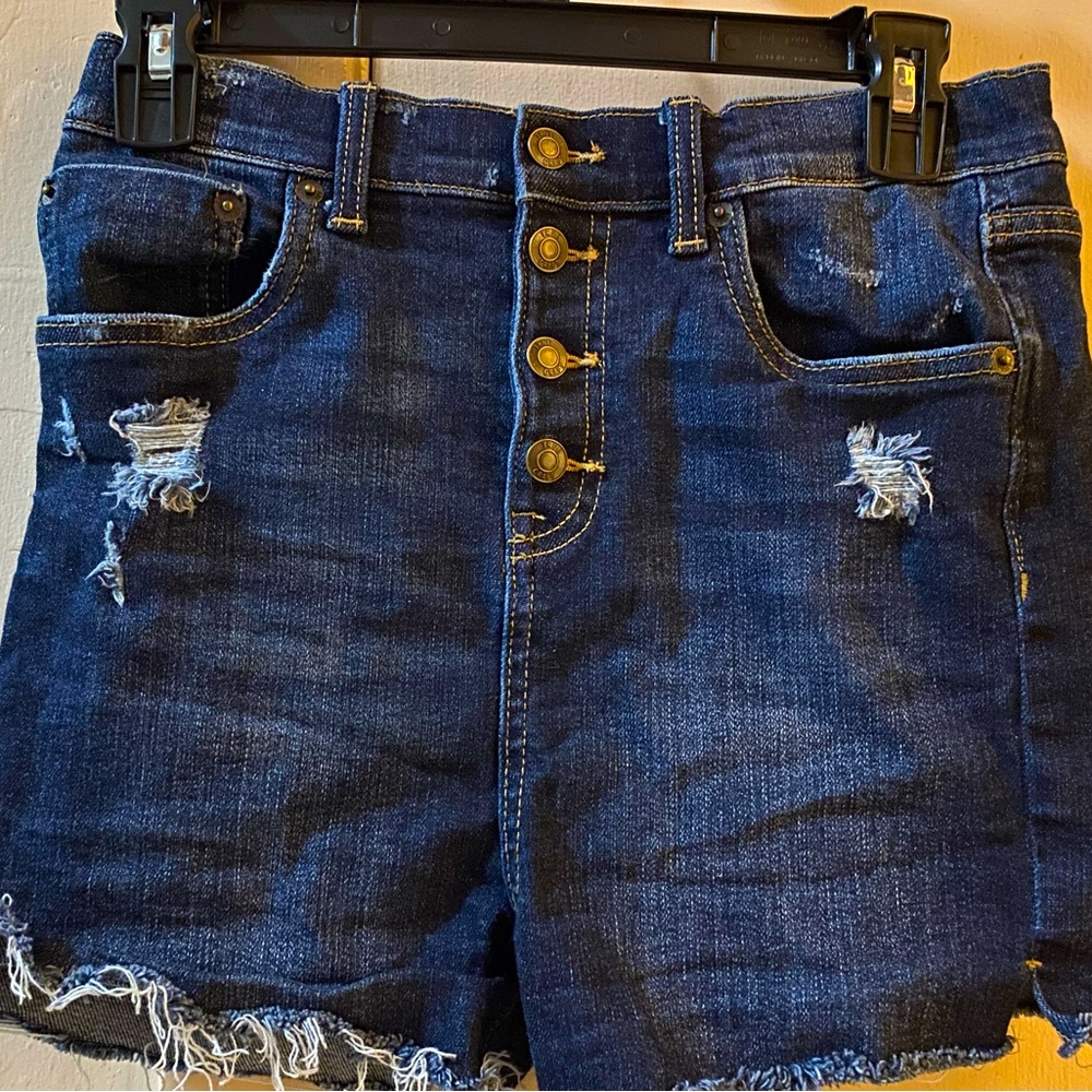 These are some dark blue Jean pants that was gifted but are too big for me .